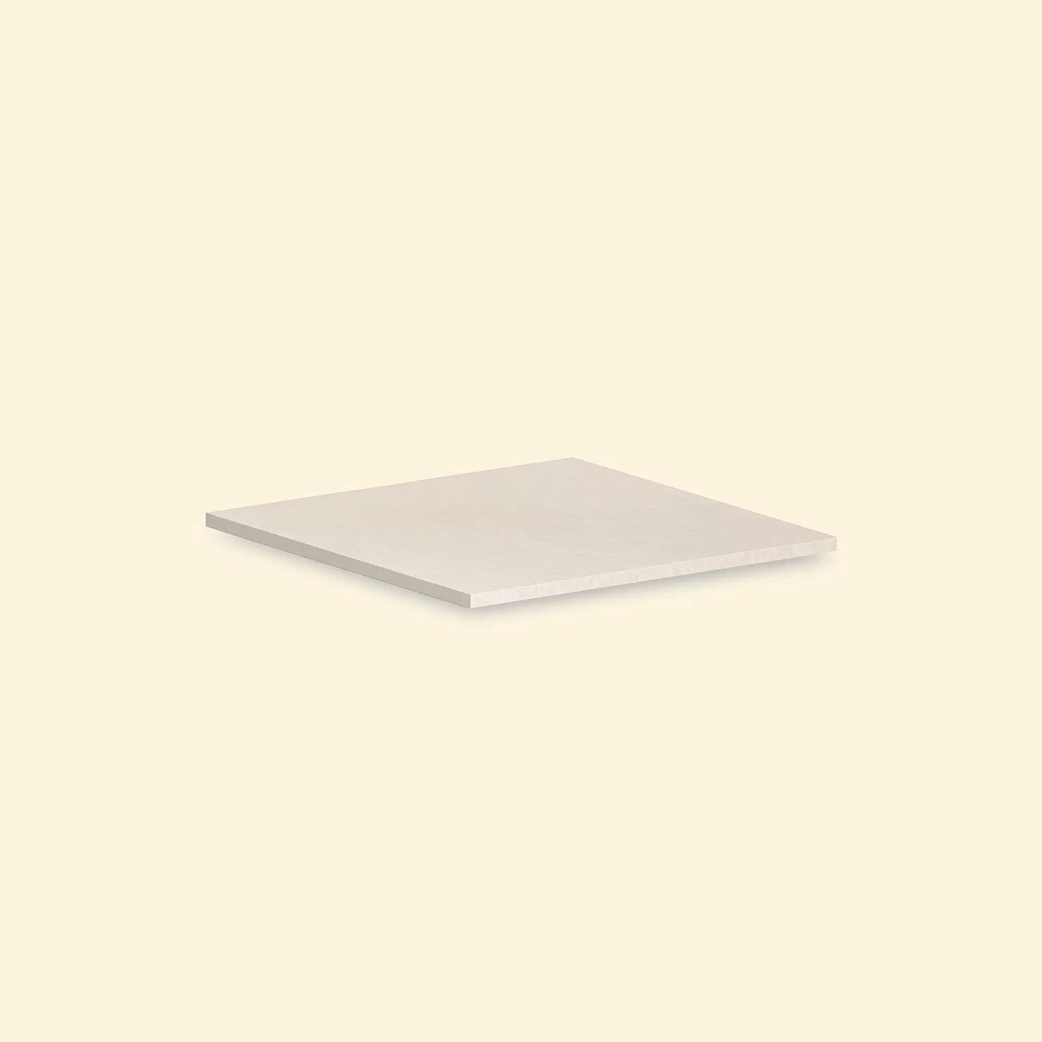 Plan de travail d'angle en céramique blanc pour cuisine extérieure Pilotis Vivaplancha.
::visuel:creme