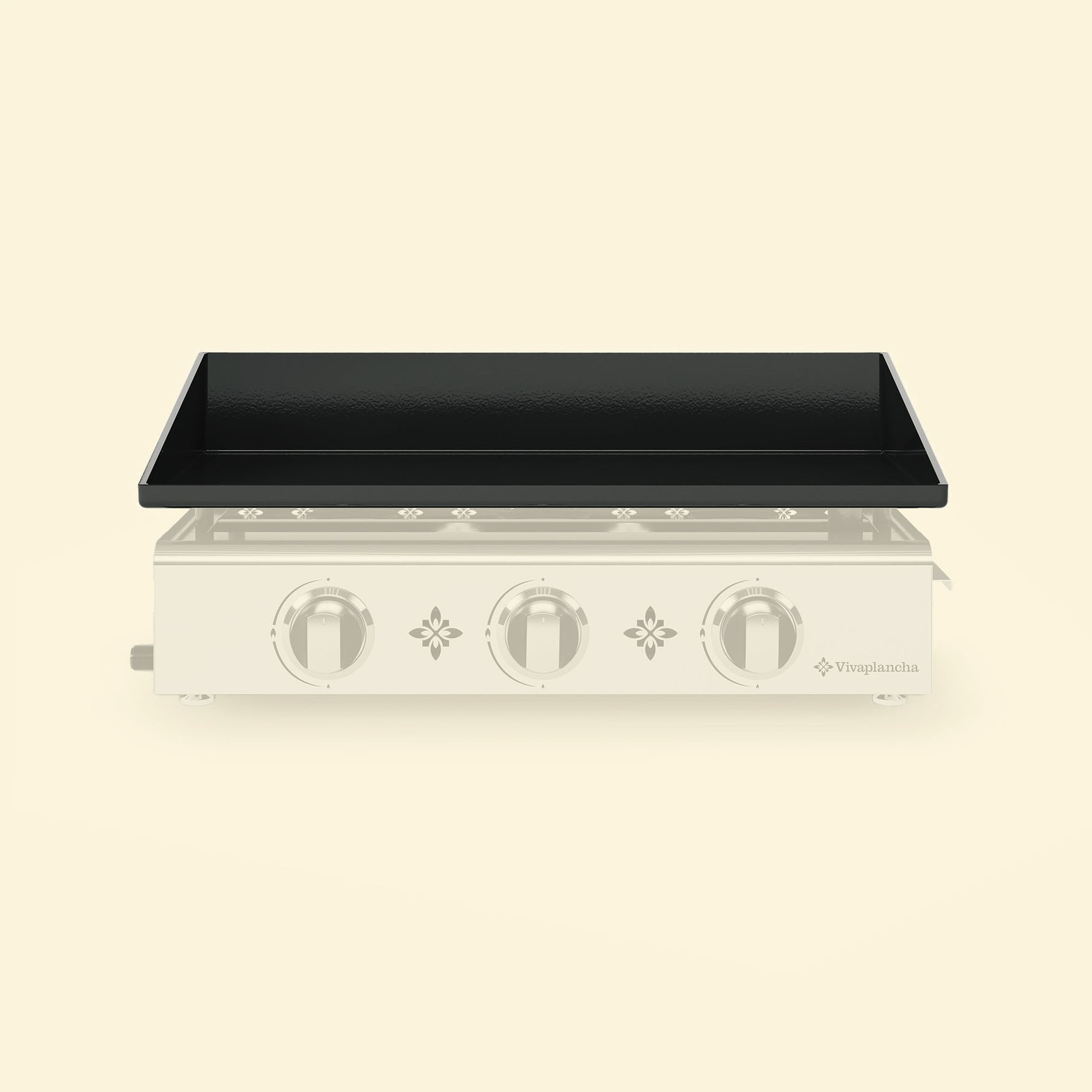 Plaque de cuisson émaillée noire pour plancha 3 feux Vivaplancha, présentée de face sur fond beige.